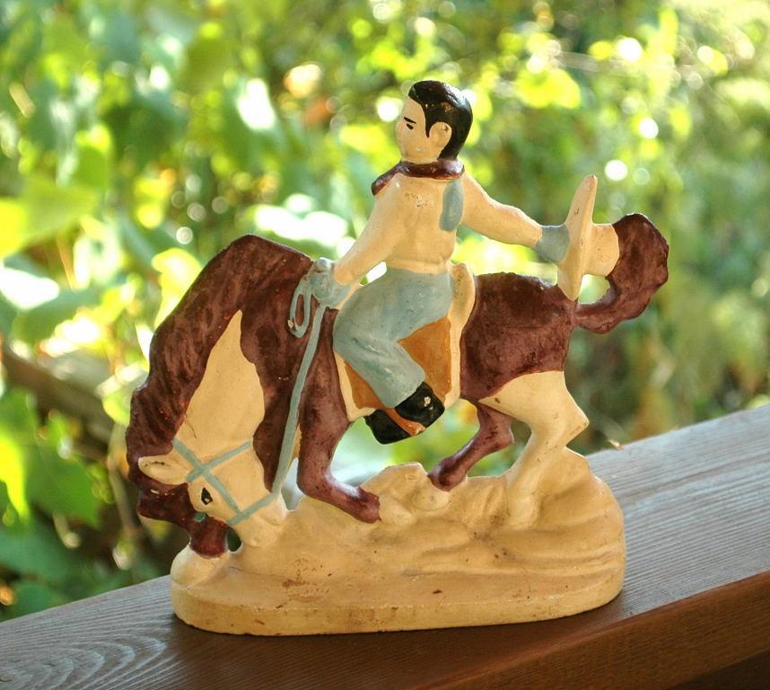 VINTAGE CAST IRON RODEO COWBOY DOORSTOP OR BOOKEND