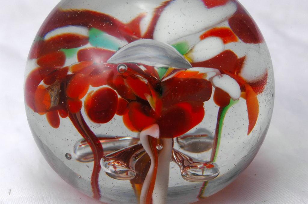 Pretty Hand Blown Art Glass Paperweight. Flowers with center bubble