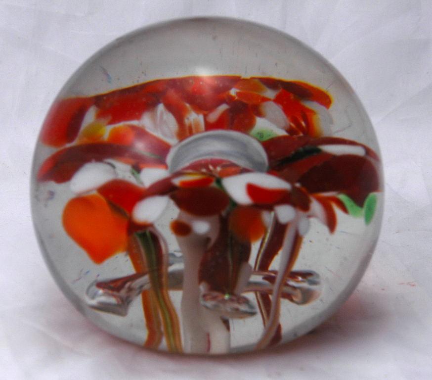 Pretty Hand Blown Art Glass Paperweight. Flowers with center bubble
