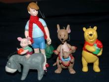 set of 4 1991 Winnie the Pooh Collection Series Hallmark Holiday Ornaments by Artist: Bob Siedler..
