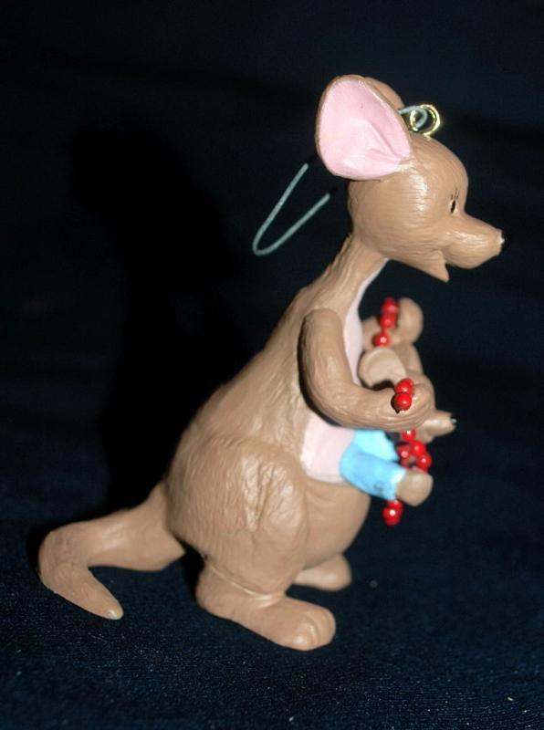 set of 4 1991 Winnie the Pooh Collection Series Hallmark Holiday Ornaments by Artist: Bob Siedler..