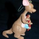 set of 4 1991 Winnie the Pooh Collection Series Hallmark Holiday Ornaments by Artist: Bob Siedler..