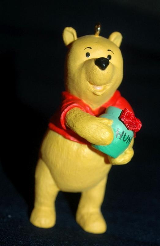 set of 4 1991 Winnie the Pooh Collection Series Hallmark Holiday Ornaments by Artist: Bob Siedler..