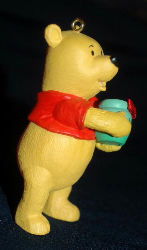 set of 4 1991 Winnie the Pooh Collection Series Hallmark Holiday Ornaments by Artist: Bob Siedler..