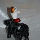 Asian Folk Art Wooden Bull with Articulated Head and Flute Player Rider.