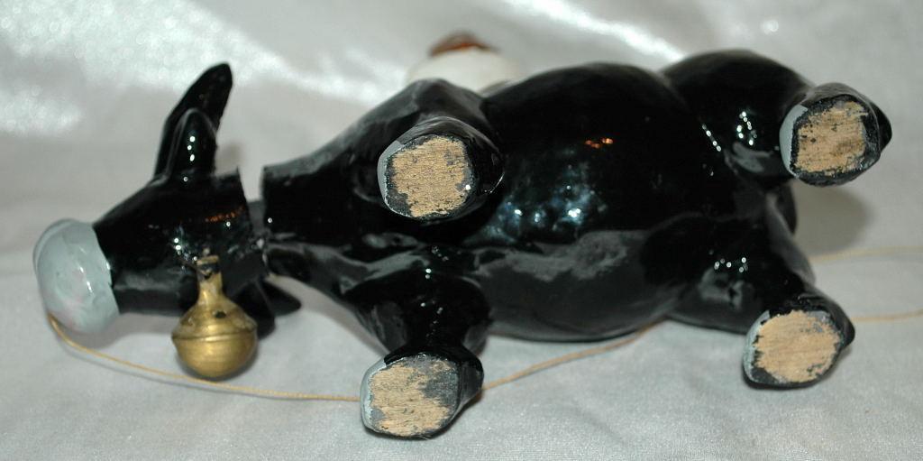 Asian Folk Art Wooden Bull with Articulated Head and Flute Player Rider.