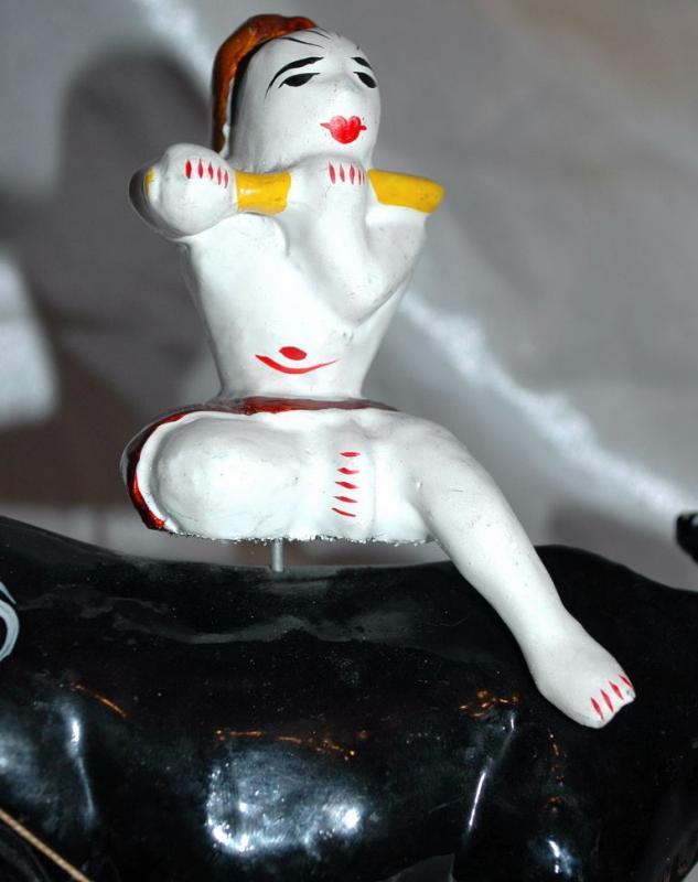 Asian Folk Art Wooden Bull with Articulated Head and Flute Player Rider.
