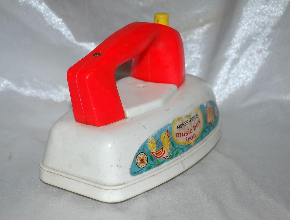 Vintage Fisher Price Musical Push Pull Toy Iron from the 1960's
