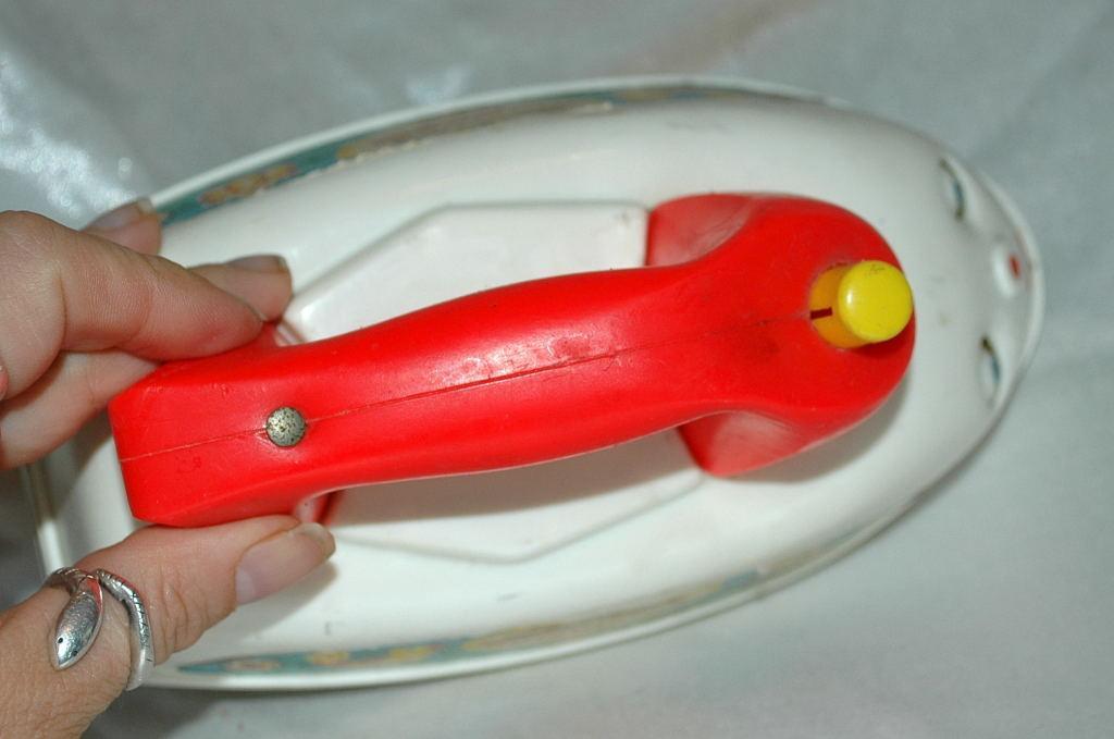 Vintage Fisher Price Musical Push Pull Toy Iron from the 1960's