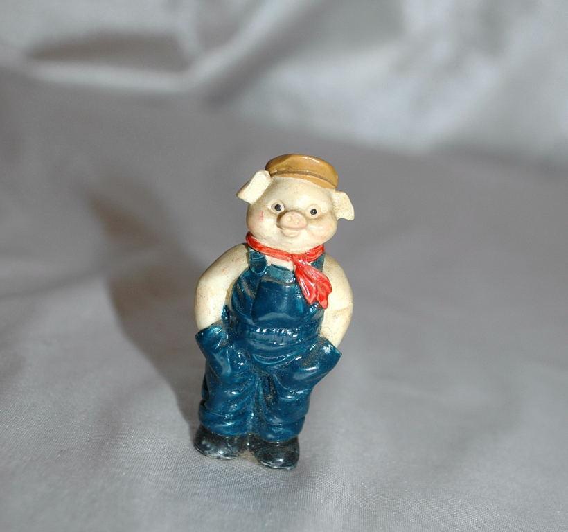Small Overall Wearing Pig Figurine