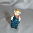 Small Overall Wearing Pig Figurine