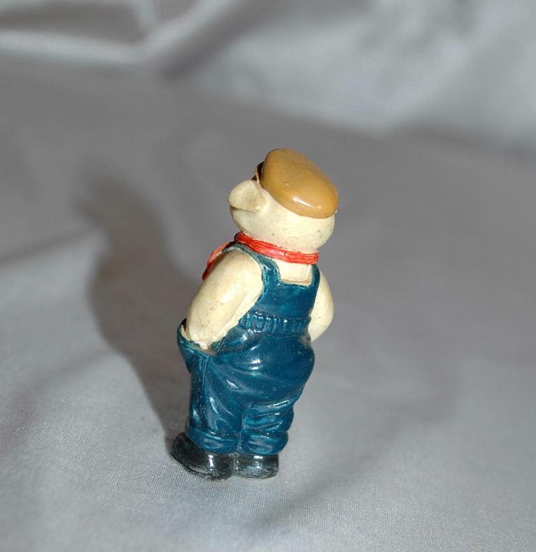 Small Overall Wearing Pig Figurine