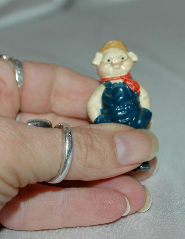 Small Overall Wearing Pig Figurine