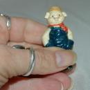 Small Overall Wearing Pig Figurine