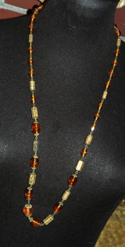 Faceted Amber Glass and Engraved Brass Necklace. Very Old
