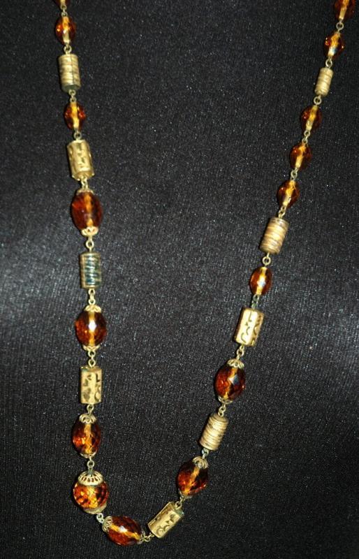 Faceted Amber Glass and Engraved Brass Necklace. Very Old