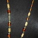 Faceted Amber Glass and Engraved Brass Necklace. Very Old