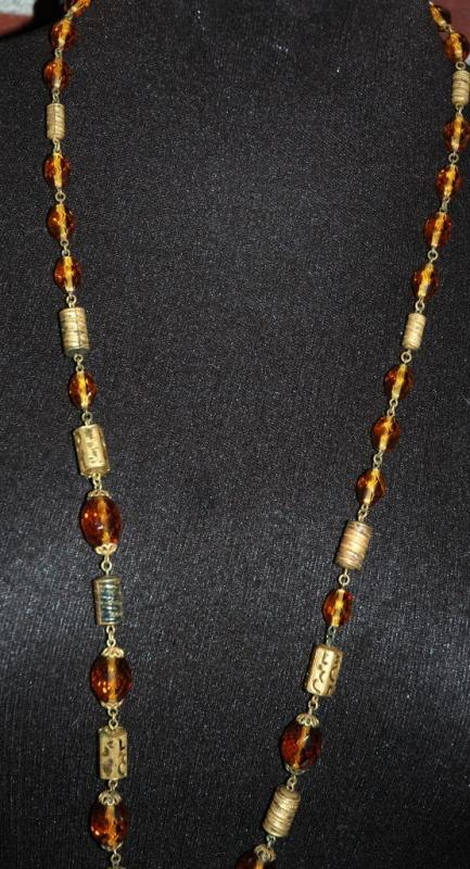 Faceted Amber Glass and Engraved Brass Necklace. Very Old