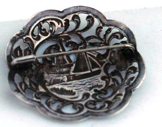 Antique Dutch Harbor Silver Repousse Brooch Pin with Sailboat and Windmill Scene