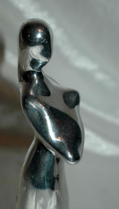 Hoselton Art Polished Aluminum Sculpture Mother holding Baby , Rare