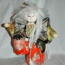 Doll of Kabuki Theatre actor as White Lion with one knee raised