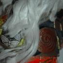 Doll of Kabuki Theatre actor as White Lion with one knee raised