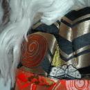 Doll of Kabuki Theatre actor as White Lion with one knee raised
