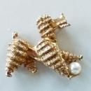BOUCHER, FRENCH POODLE WITH AN AUTHENTIC CULTURED PEARL. SIGNED AND NUMBERED