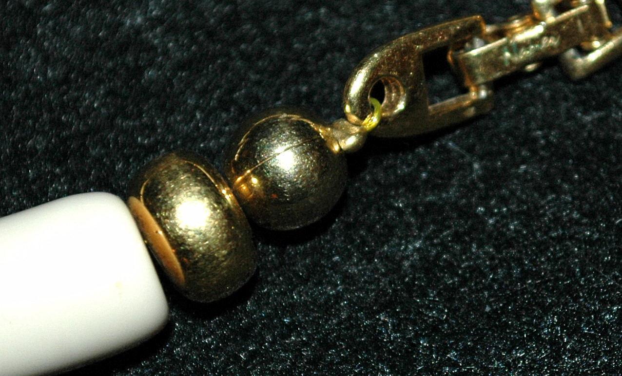 Trifari Chunky Necklace, High Fashion, Enameled Gold Tone Center piece and Ivory Colored Beads.