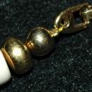 Trifari Chunky Necklace, High Fashion, Enameled Gold Tone Center piece and Ivory Colored Beads.