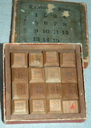 The New Solitaire wood blocks Game of Fifteen