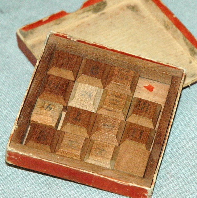 The New Solitaire wood blocks Game of Fifteen