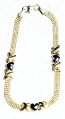 10K Yellow and White Gold Heart Bracelet 7