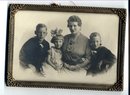 Framed Antique Photo of Mother & Children ( boys in sailor suits and the girl with big bow. )