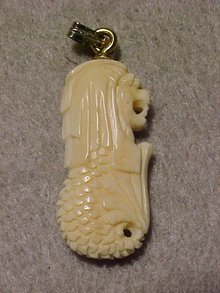 Chinese Lion Head with Fish Tail Pendant of Ivory