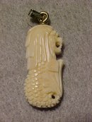 Chinese Lion Head with Fish Tail Pendant of Ivory