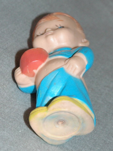 Vintage Squeak Toy Boy with P.J's falling down in back