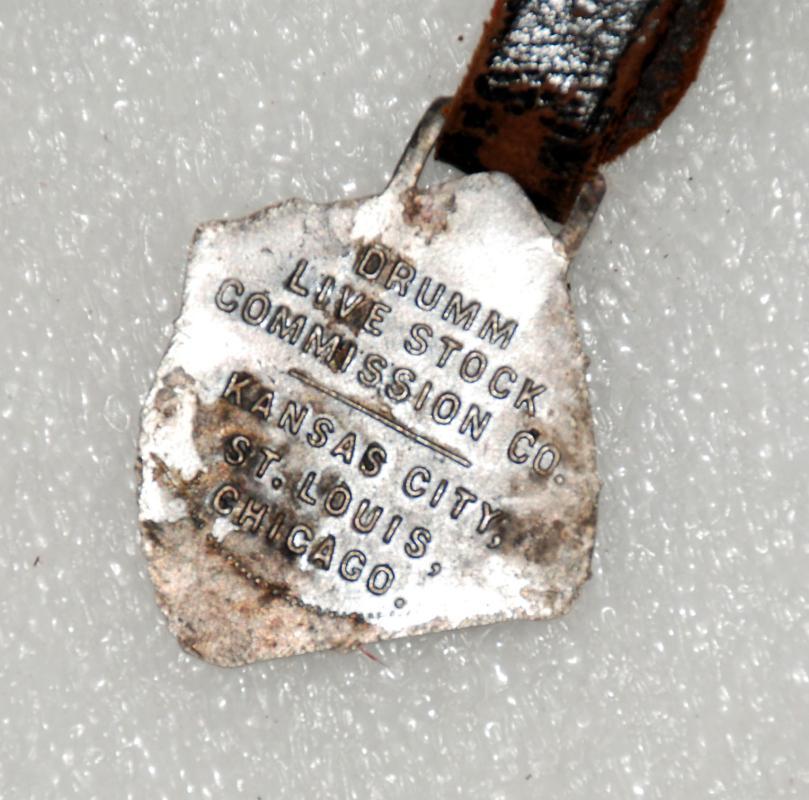 OLD DRUMM LIVESTOCK FIGURAL METAL ADVERTISING POCKET WATCH FOB / Ranching Farm Collectible Early 1900's