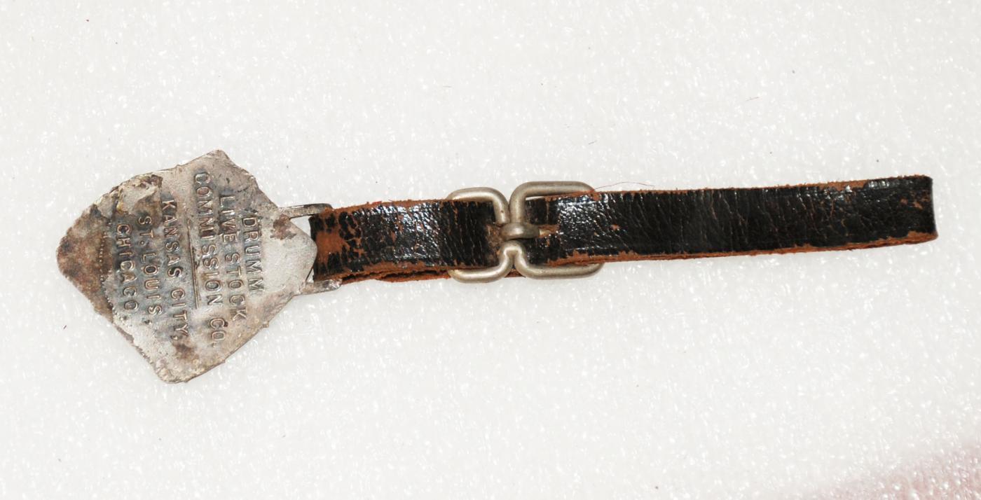 OLD DRUMM LIVESTOCK FIGURAL METAL ADVERTISING POCKET WATCH FOB / Ranching Farm Collectible Early 1900's