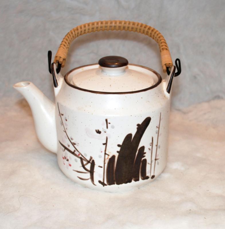 Japanese Stoneware Teapot austere brown decoration on white.