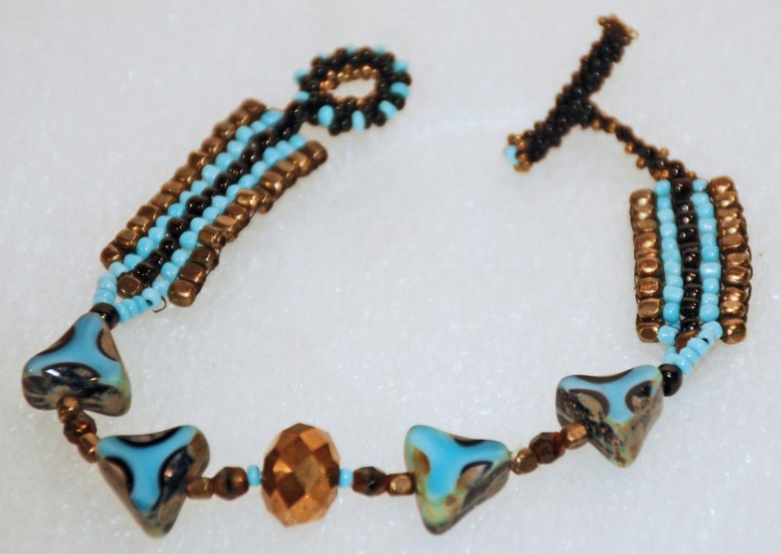 Sky Blue Woven Beaded Bracelet with Triangle Faceted Table Cut Triangle Beads and Faceted Bronze Bead / Hand Crafted one of a kind