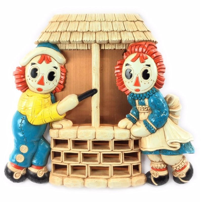 1977 BOBBS-MERRILL CO. RAGGEDY ANN and ANDY copper mirror/ well wall plaque