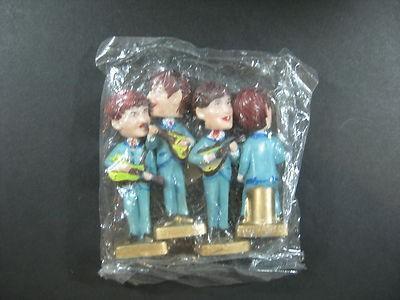 1960'S BEATLES NODDERS CAKE TOPPERS IN ORIGINAL SEALED CELLO PACKAGE