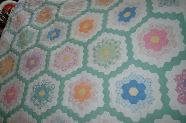 Double ring grandmother's garden hexagon quilt.