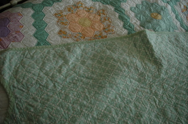 Double ring grandmother's garden hexagon quilt.