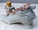 Wales Porcelain Boy Angel On Flowered Shoe