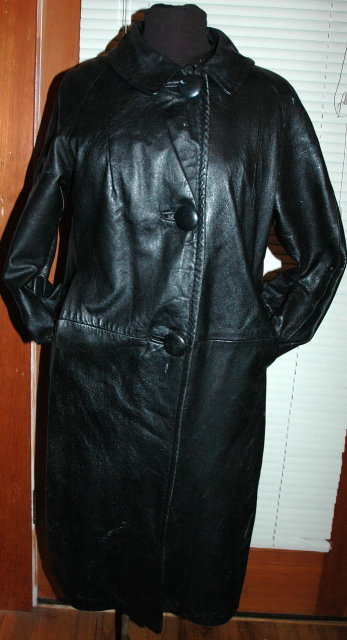 Vintage Black Leather Coat with zip in faux fur lining.