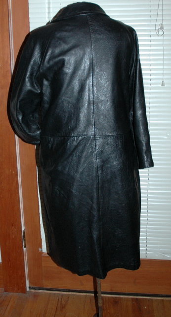 Vintage Black Leather Coat with zip in faux fur lining.