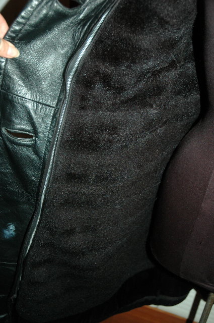 Vintage Black Leather Coat with zip in faux fur lining.