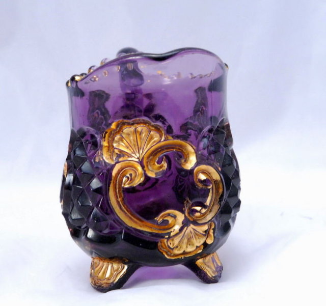 Elegant Amethyst Glass Pressed Glass Creamer with Gold Trim